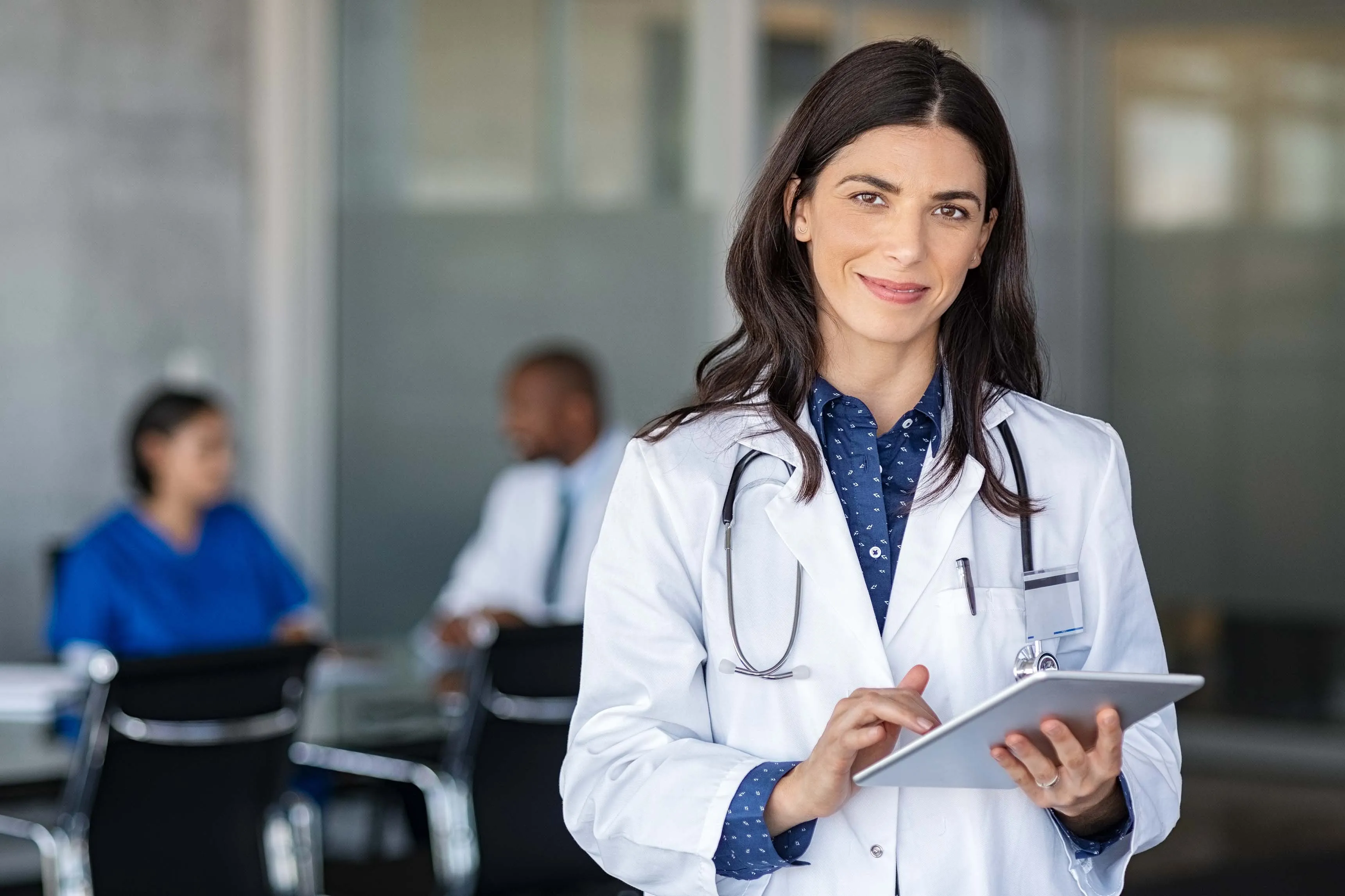 Anesthesia provider reviewing a patient chart before a procedure