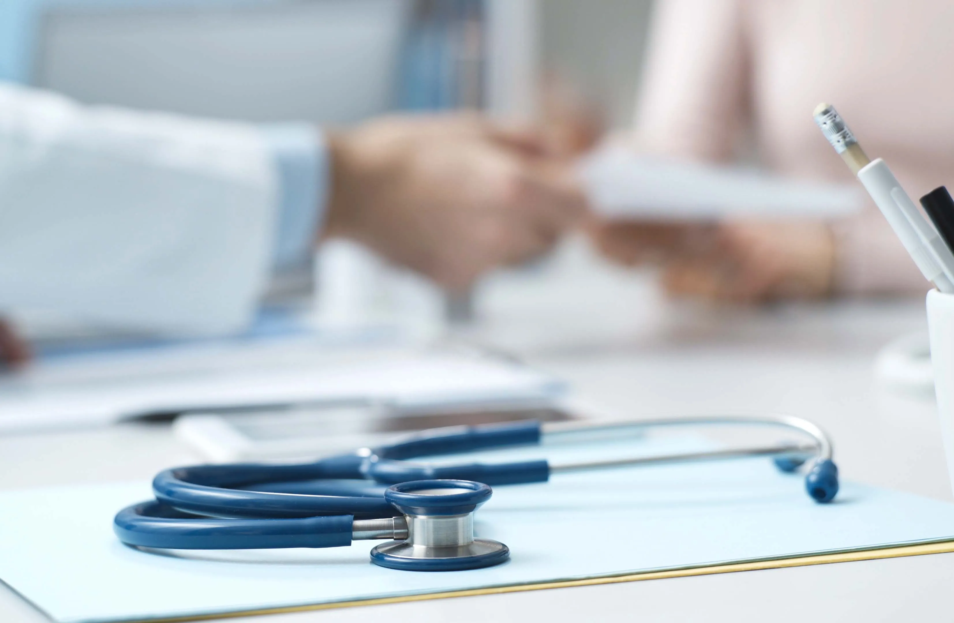 Stethoscope in focus at a doctor's office